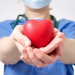 Doctor holding a heart