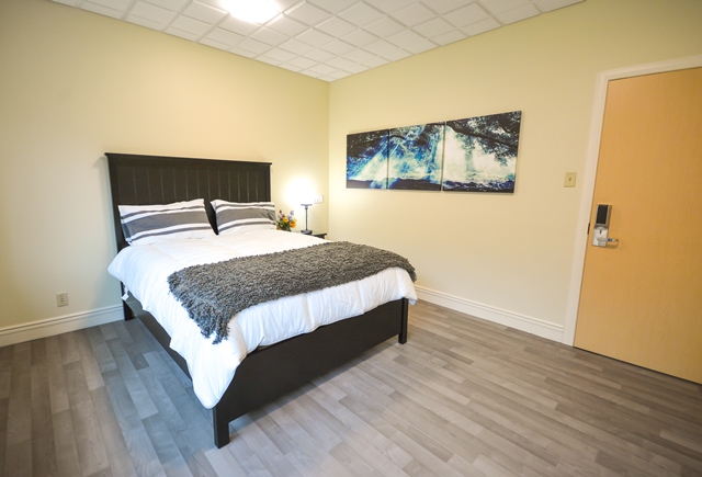 One of two family guest suites on the family and caregiver floor of the new Palliative Care Unit, for families who want to stay overnight. It contains a bathroom spa, closet and flat screen television.