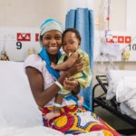 Aissata, cleft lip patient, in the ward after surgery with her mother.